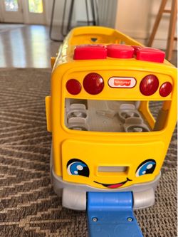 Fisher price yellow bus