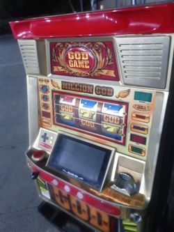 Slot machine with tokins