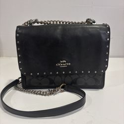 Coach Klare Crossbody Bag in Signature Canvas with Rivets.