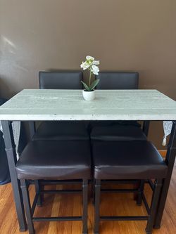 High counter table with stools and chairs