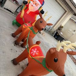 Santa With Sleight And Reindeers