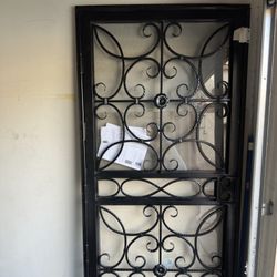 Madrid 36 in. x 80 in. Universal/Reversible Powder Coated Black Wrought Iron Steel Security Door 