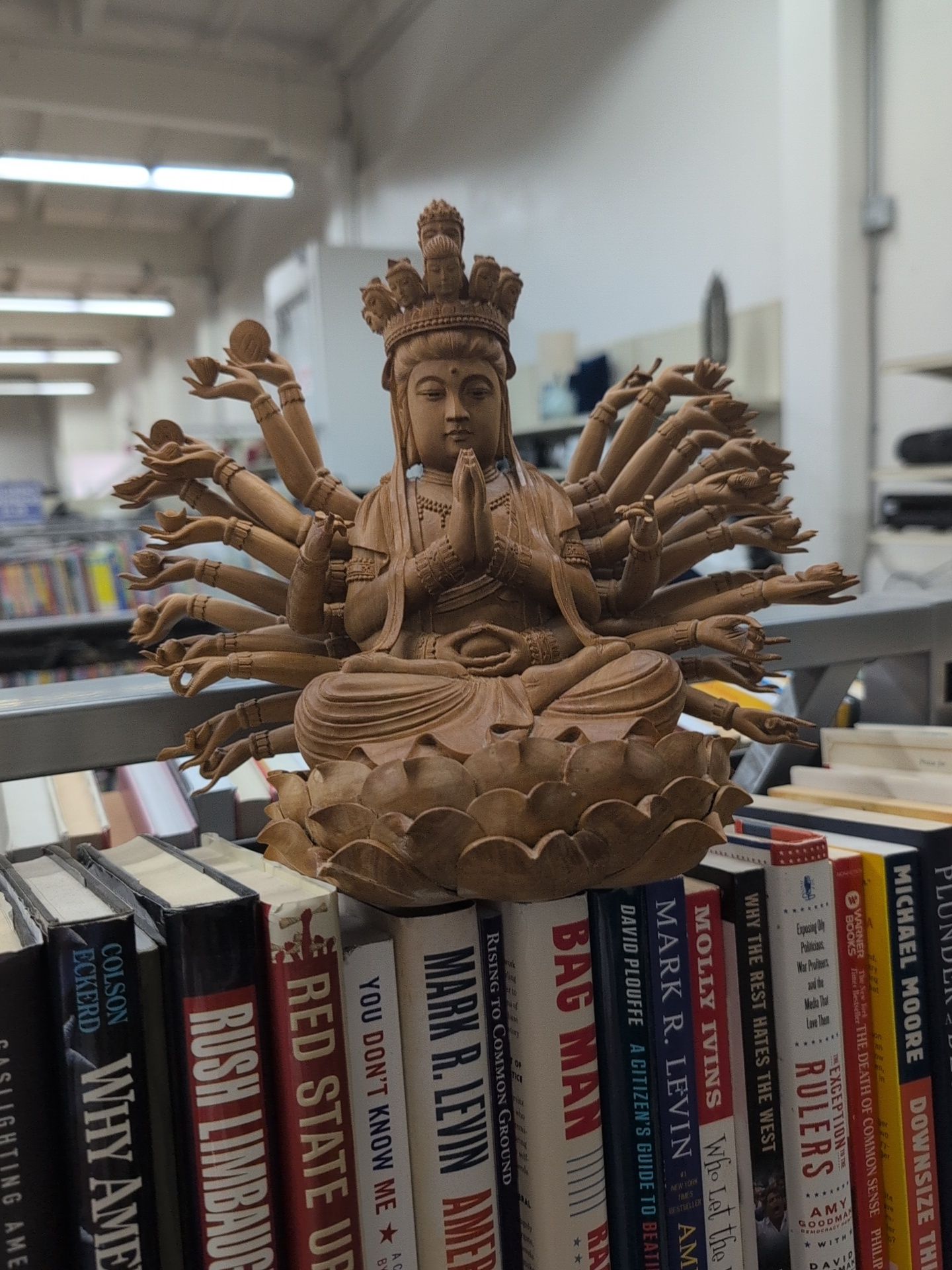 Thousand arms budda statue carving