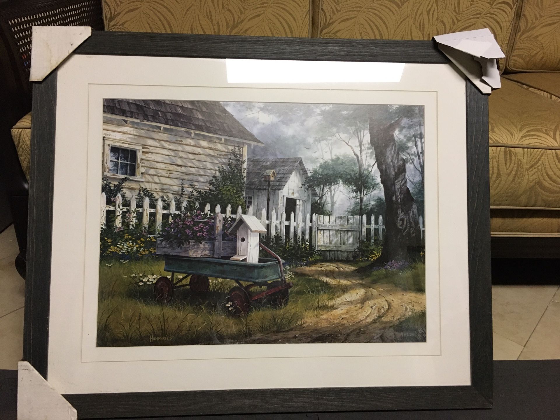 Panting of old home with white fence on a rustic wood frame and glass