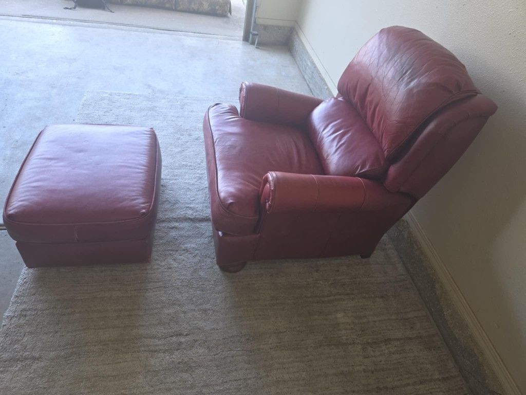 Red leather chair and ottoman