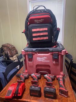Milwaukee (2) impacts (1 ) drill (1) multi-tool (1) charger (1) pack out box (1) back pack (2) batteries