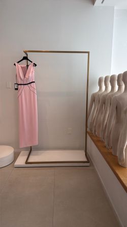 Brass clothing racks with heavy marble bases