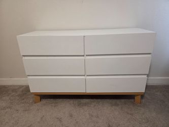 White dresser with oak legs