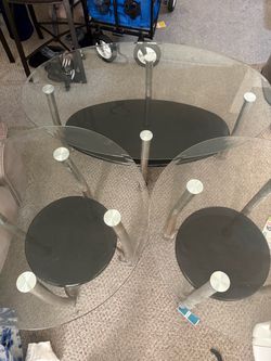 Glass end tables and coffee table