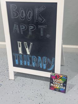 White Chalkboard Sidewalk Sign