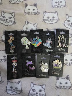 Assorted disney pins