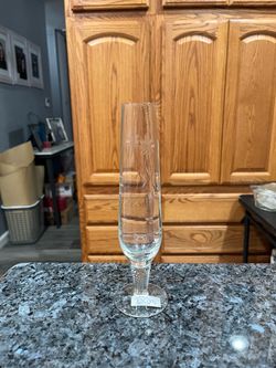 Crystal Etched Glass bud vase. Size approximately 8 inches tall. Preowned excellent condition. Smoke free home