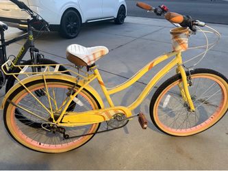 Yellow cruise bike women