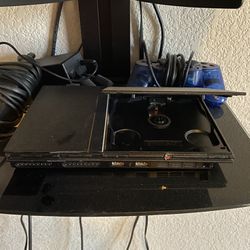 PS2 with 6 games 