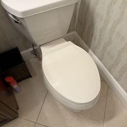 Holder two piece toilet