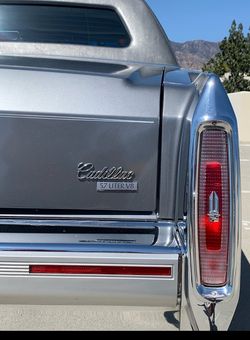 Brougham 5.7 trunk badge