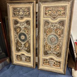Pair of large wooden and mirror panels with ornate decorative carvings and a central round mirror - 25” x 60” - Originally $1200