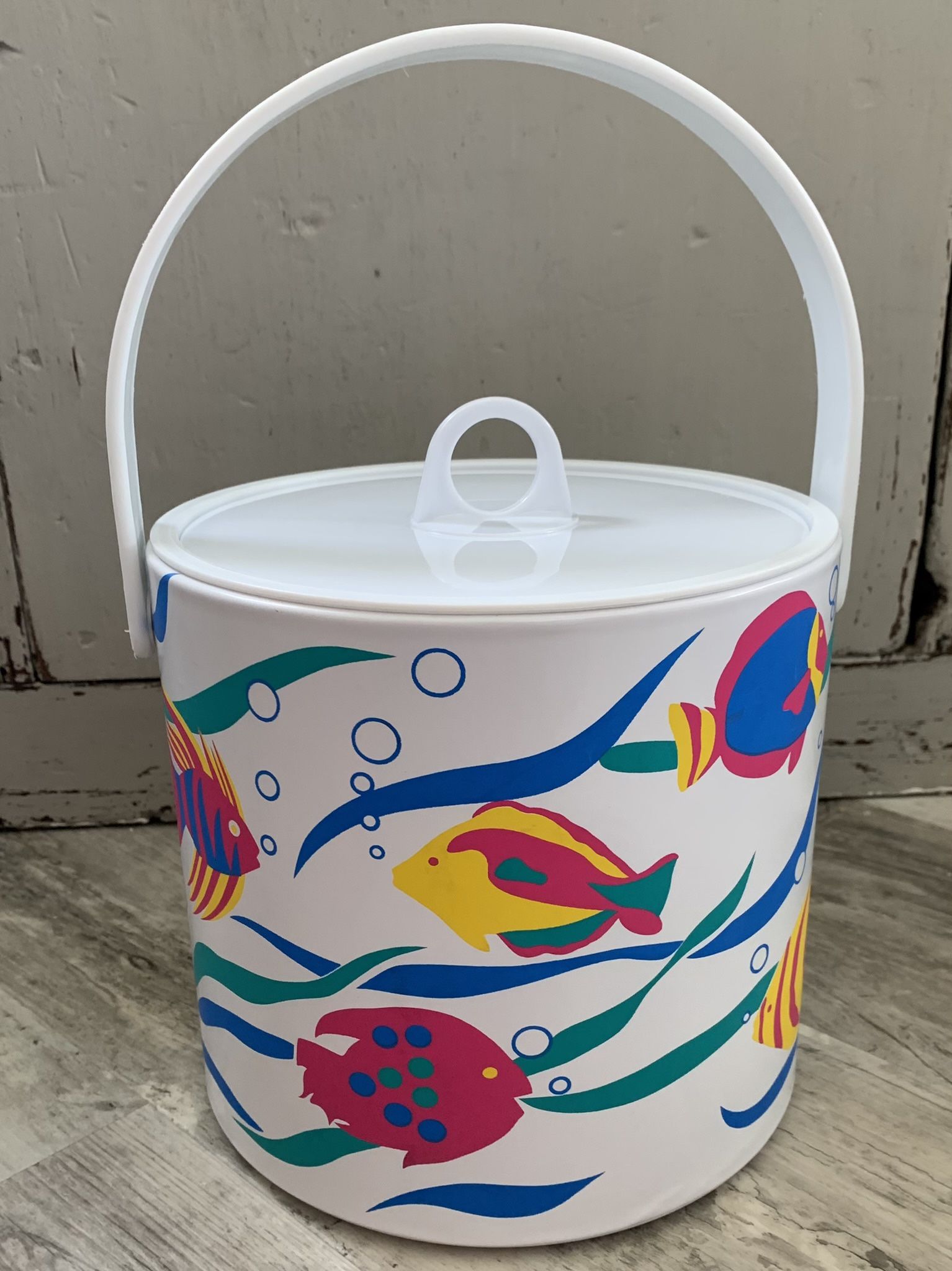 Vintage mod retro colorful salt water fish ice bucket (early 1970s) Bucket, handle and lid are plastic with a vinyl covering with different fish