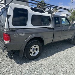 Camper shell and rack