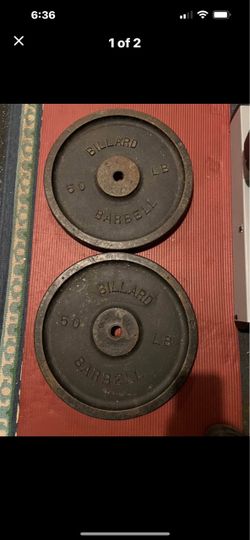 Weight two 50 lbs plates. 1 in hole.
