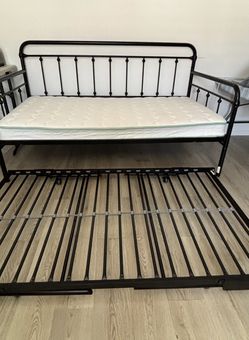 Metal day bed with free two twin size mattress