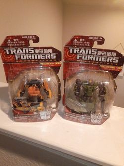 Transformers Generations 2012 Scout Class Decepticon Brawl 
And  class SANDSTORM