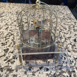 Antique Spinning Yellow Bird in Cage Music Box