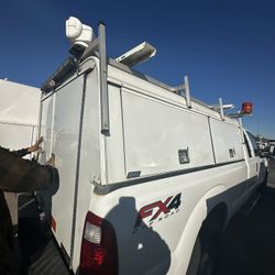 Camper with Ladder Rack 
