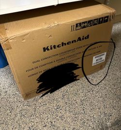BRAND NEW KITCHENAID BLACK/ SILVER DUAL CONVECTION OVEN WITH AIR FRYER MODEL NUMBER: KCO224BM PICKUP ONLY.