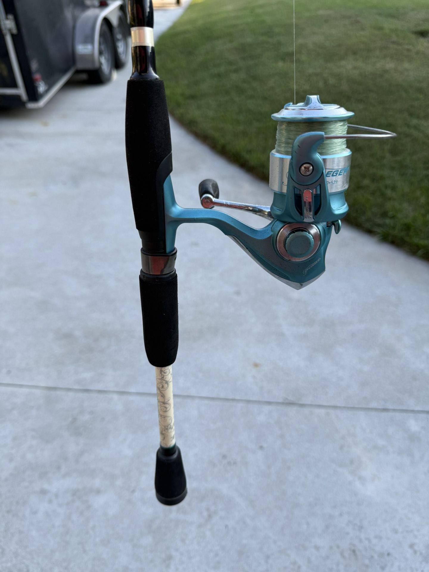 Pflueger Lady Trion spinner on 5’10” Pflueger Ladt Trion rod. #36