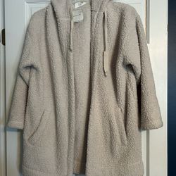 American Eagle fuzzy hooded jacket size M  Pockets are even lined with fuzzy soft material  Color oatmeal  Great condition  Smoke free home  Make an o