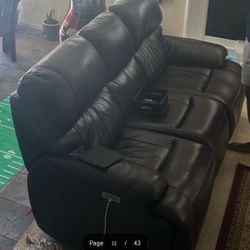 2 Leather, full size electric recliner sofas. Dark brown color.