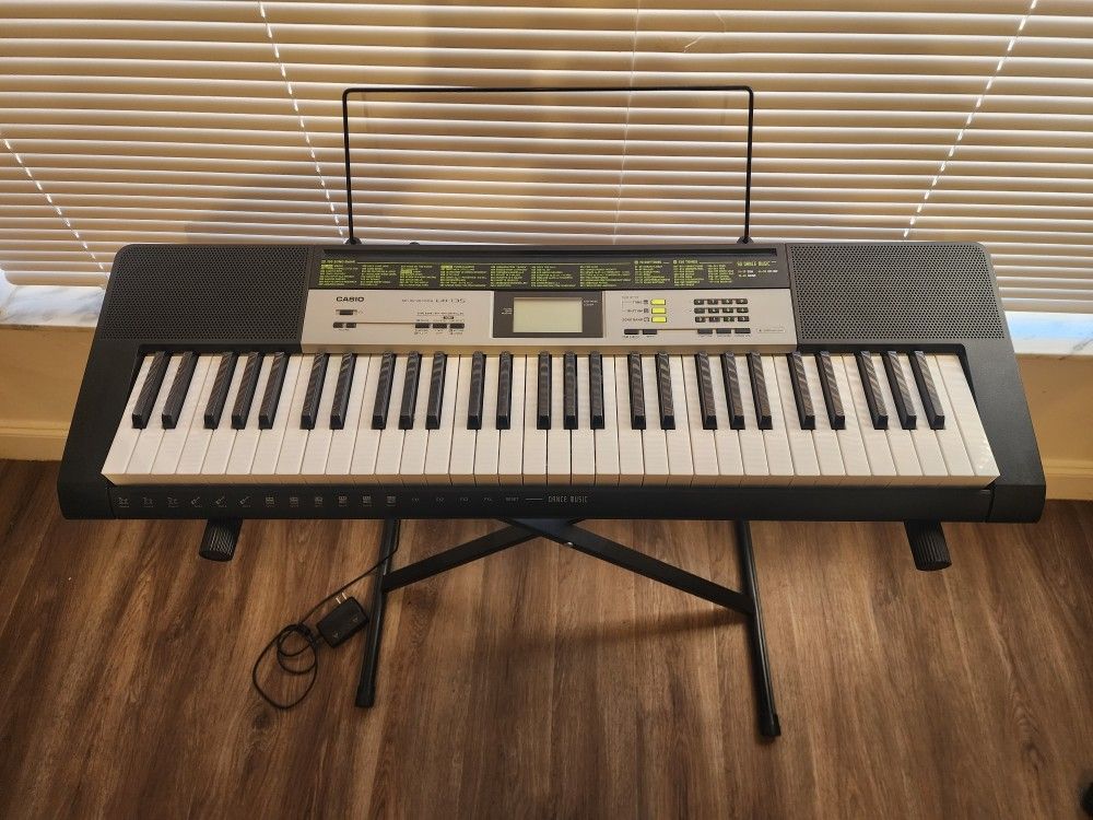 Electronic Keyboard With Base Like New