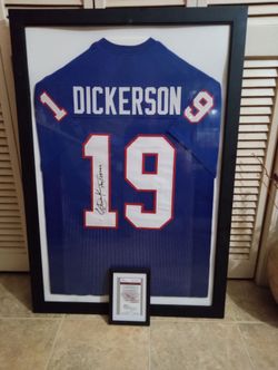 Eric Dickerson signed frame Jersey with J S.A. letter of authenticity.