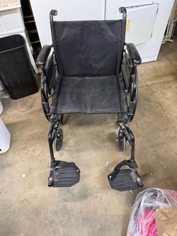 Black Folding Wheelchair with Footrests