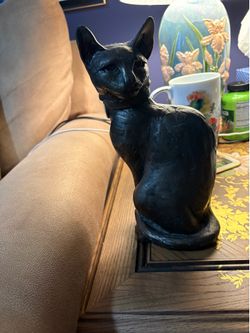 Brass cat statue