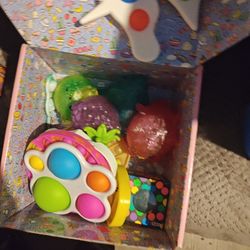 Box With Various Small Toys