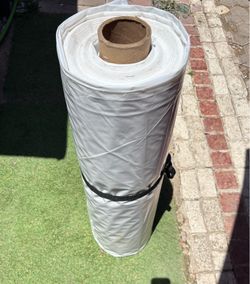 Heavy-duty plastic sheeting roll for covering