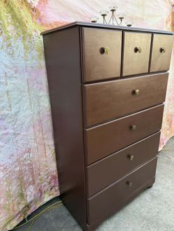 Wooden dresser solid heavy wood with extra large drawers colors brown and antique gold has been painted