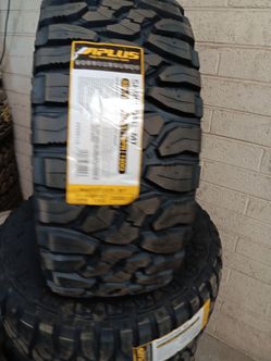 New set of tires aplus mud terrain 33 1250 17