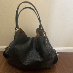 Beautiful Embossed Coach Purse