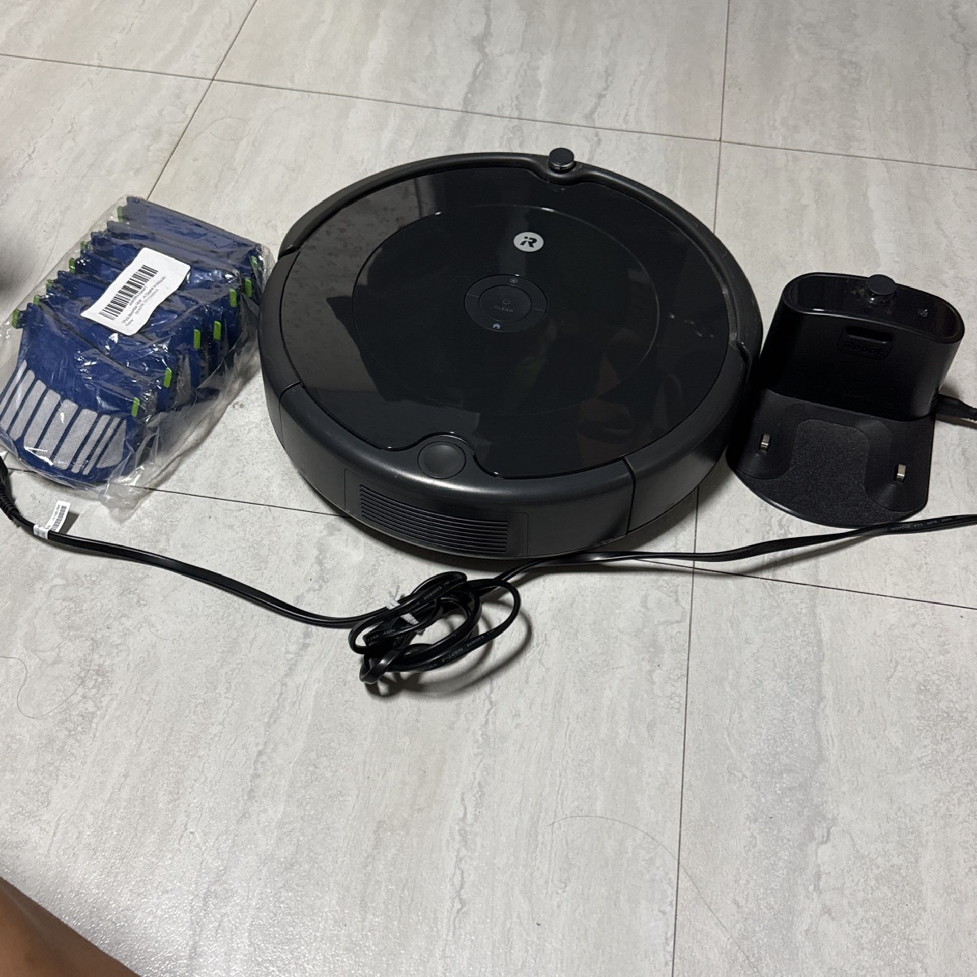 Robot vacuum (Filters And home Base Included)