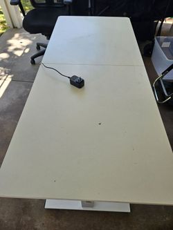 Adjustable height desk and chair