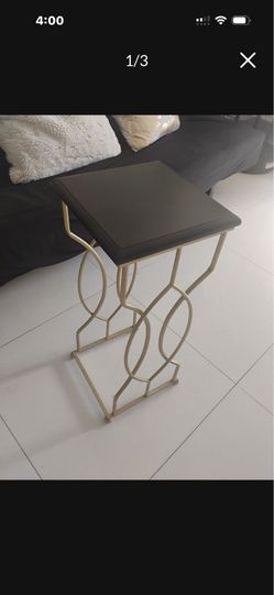 Black and gold coffee table metal / wood