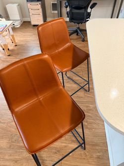 Counter stool X2 from Dania Furniture,  faux leather, easy to clean, used for less than a year.