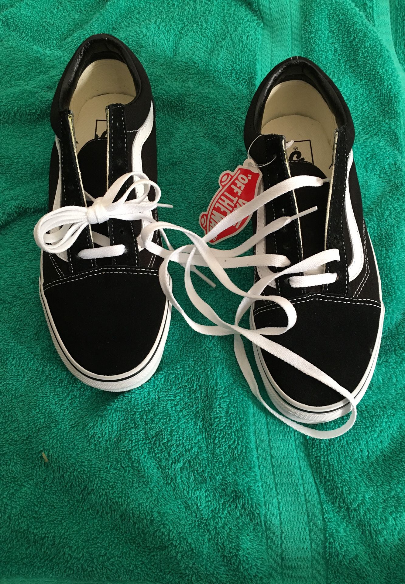 Black and white vans size 7.5men and size 9 women