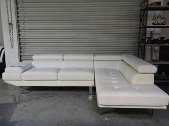WHITE LEATHER SECTIONAL WITH CUP HOLDERS AND STORAGE