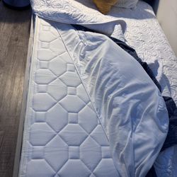 small twin bed with lamp