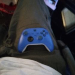 Xbox One With A Controller And With Games