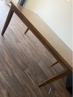 Table with 4 chairs and a bench